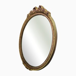 Handgeschnitzter und vergoldeter Ovaler Wandspiegel, frühes 19. Jh.