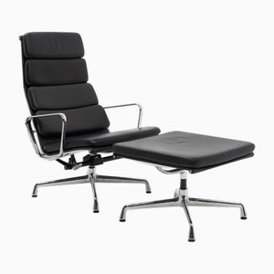 Alu Group Soft Pad Sessel und Fußhocker von Charles and Ray Eames für Vitra