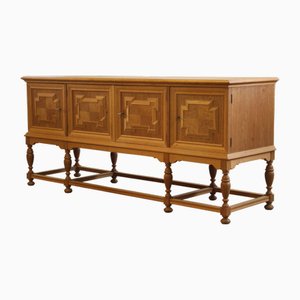 Niedriges dänisches Vintage Sideboard aus Eiche von Henning Kjærnulf, 1960er