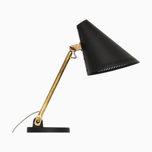 Table Lamp in Brass and Black Lacquered Metal attributed to Paavo Tynell, 1950s