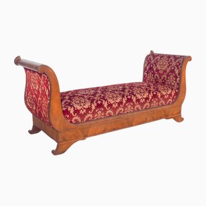 Canapé estilo Imperio francés tapizado en tela roja