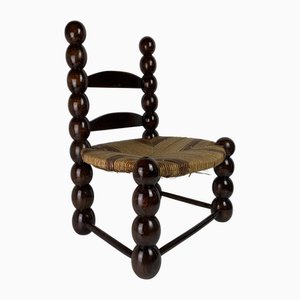 Brutalist Wood Turned Bobbin Low Rush Chair from Charles Dudouyt, France, 1950s