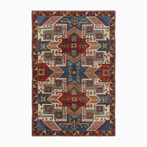 Türkischer Vintage Tribal Teppich in Rot und Blau mit Medaillon