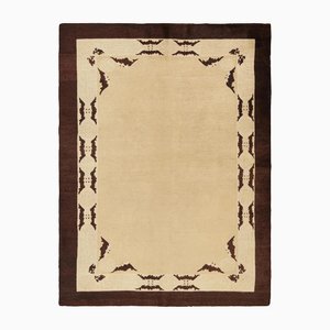 Tappeto Pechino con motivi beige in campo aperto e marroni