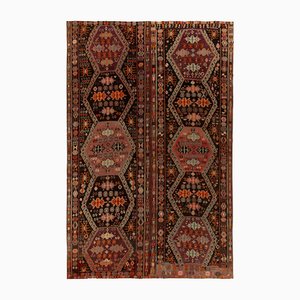 Vintage Kelim Teppich mit geometrischen Tribal-Mustern