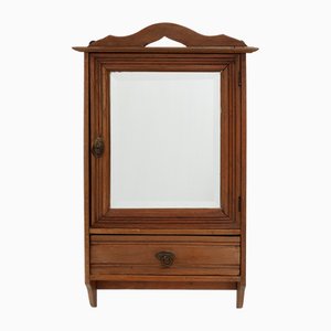 Französischer Art Deco Rasierschrank aus geschnitztem Holz mit abgeschrägtem Spiegel, 1920er