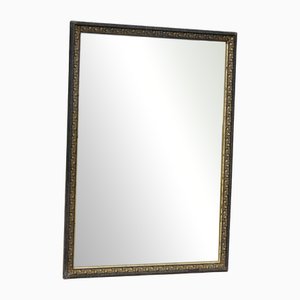 Antiker Spiegel mit Rahmen in Schwarz & Gold, 1890er