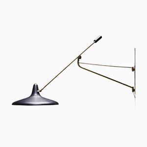 Lampada da parete nr. 3030 in ottone e metallo nero di Stilnovo, Italia, anni '50