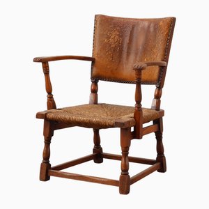 Poltrona in pelle e quercia di Theo Ruth per Artifort, Paesi Bassi, anni '40