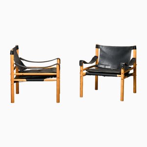 Sirocco Safari Lounge Chairs in Black Leather and Ash by Arne Norell for Arne Norell AB, Sweden, 1970s, Set of 2