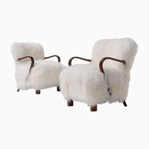 Scandinavian Art Deco Lounge Chairs in Mongolian Sheepskin, 1950s, Set of 2