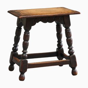 Sgabello o tavolino rustico in quercia tornita e intagliata, XIX secolo