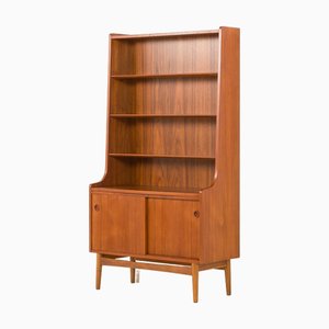 Teak Bücherregal mit Schiebetürenfach von Johannes Sorth für Nexo, Bornholm, Dänemark, 1960er