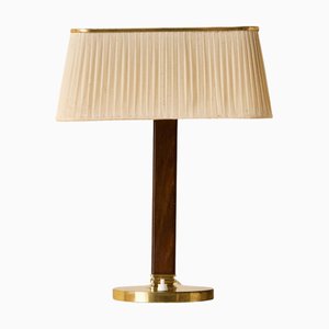 Vintage Tischlampe aus Messing von Paavo Tynell für Taito Oy, 1940er