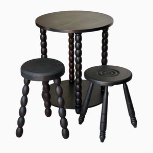 Tavolino e sgabelli in legno nero, anni '50, set di 3