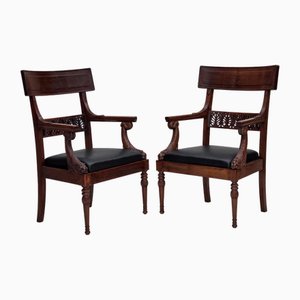 Poltrone in teak intagliato e pelle secondo Georges Jacob, anni '20-'30, set di 2