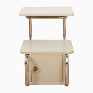 Comodino con struttura in tubo di acciaio cromato