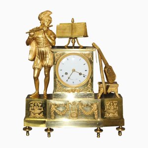 Orologio Trovatore Carlo X in bronzo dorato