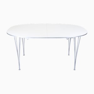 Mesa de comedor Super Ellipse con superficie de laminado blanco de Piet Hein and Bruno Mathsson para Fritz Hansen, 2005