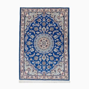 Handgeknüpfter orientalischer Teppich aus Schurwolle und Seide