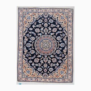 Orientalischer Teppich aus Schurwolle und Seide