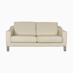 Divano a due posti Antonia in pelle color crema di Leolux