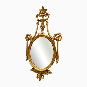 Specchio neoclassico dorato con aquila intagliata, inizio XIX secolo