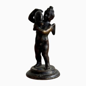 Bronze Sculpture of Angel Carrying Dolphin
