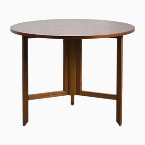 Mesa redonda de caoba de André Sornay para Meubles Sornay, años 60