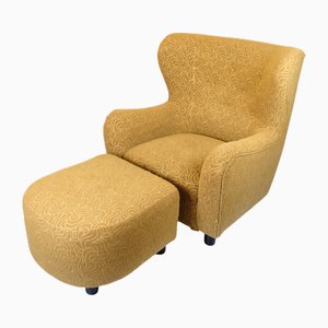 Poltrona con poggiapiedi in tessuto giallo, anni '40