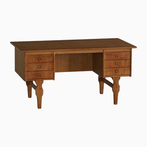 Escritorio danés vintage de roble de Henning Kjærnulf, años 50