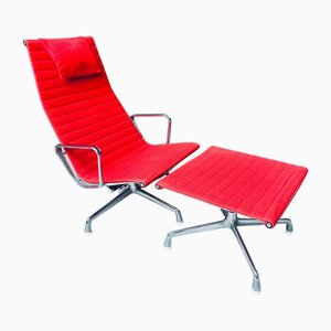 Set di sedia EA 124 in alluminio e poggiapiedi EA 125 di Charles & Ray Eames per Herman Miller & Vitra, anni '60, set di 2