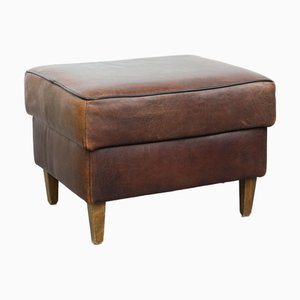 Otomana vintage de piel de oveja