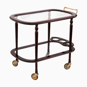 Carrito de servicio vintage de dos niveles de madera barnizada y vidrio con detalles de latón, 1940