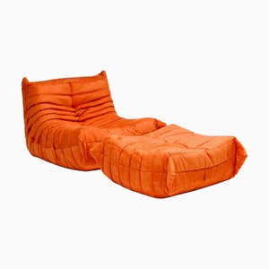 Poltrona Togo arancione e poggiapiedi di Michel Ducaroy per Ligne Roset, inizio XXI secolo, set di 2