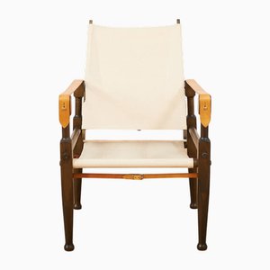 Safari Stuhl mit Gestell aus Buchenholz, Stoffbezug und Lederarmlehnen von Wilhelm Kienzle für Heydebrand SWB Bern, 1928