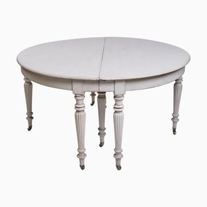 Tavolo da pranzo rotondo in stile gustaviano con ruote in ottone, fine XVIII secolo