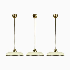 Lampade Art Deco in vetro opalino color crema e ottone, Germania, anni '30, set di 3