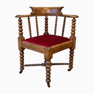 Antiker Bobbin Drehsessel mit rotem Samtsitz, 1920er