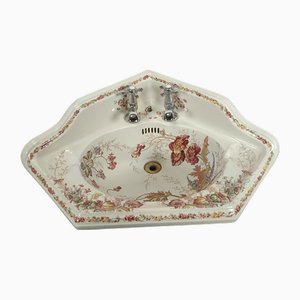 Lavabo de esquina antiguo de porcelana