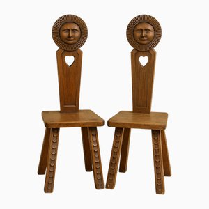 Hand-Carved Catalan Oak Chairs with Sun Motifs, 1920s, Set of 2