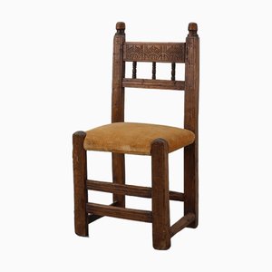 Silla auxiliar española de roble tallado a mano con asiento de terciopelo, siglo XIX