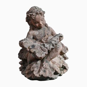 Statua antica cherubino da giardino in terracotta