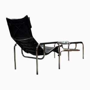 Set of Lounge Armchair and Ottoman in Tubular Steel and Leather by Hans Eichenberger for Strässle, Switzerland, 1970s