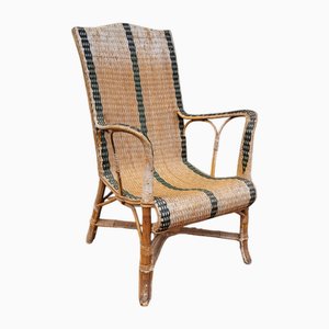 Sillón vintage de ratán, años 50