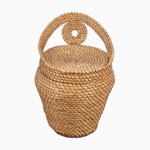 Taburete vintage de paja y mimbre con cesta de almacenamiento, años 60