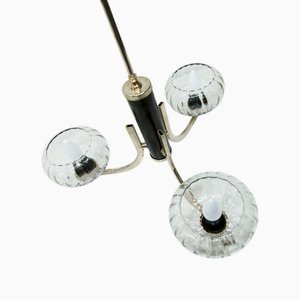 Lámpara de araña de tres brazos en negro y dorado con pantalla de vidrio transparente de See Delmas, años 60