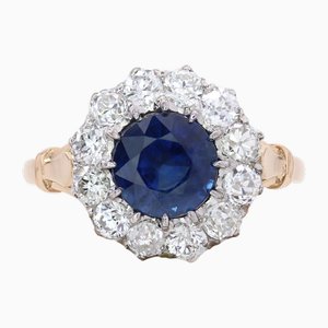 Gänseblümchenring aus 18 Karat Gelbgold und Platin mit Saphir und Diamanten, 20. Jahrhundert