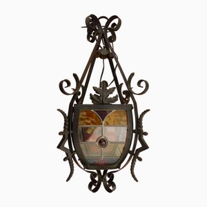 Lampada a sospensione Art Déco in ferro battuto e vetro colorato, anni '30