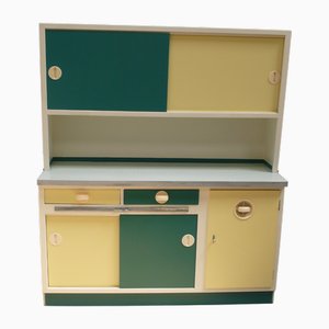 Mueble de cocina con puertas correderas y mesa extraíble de Musterring International, años 50